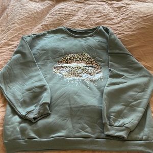 Graphic crew fleece sweater